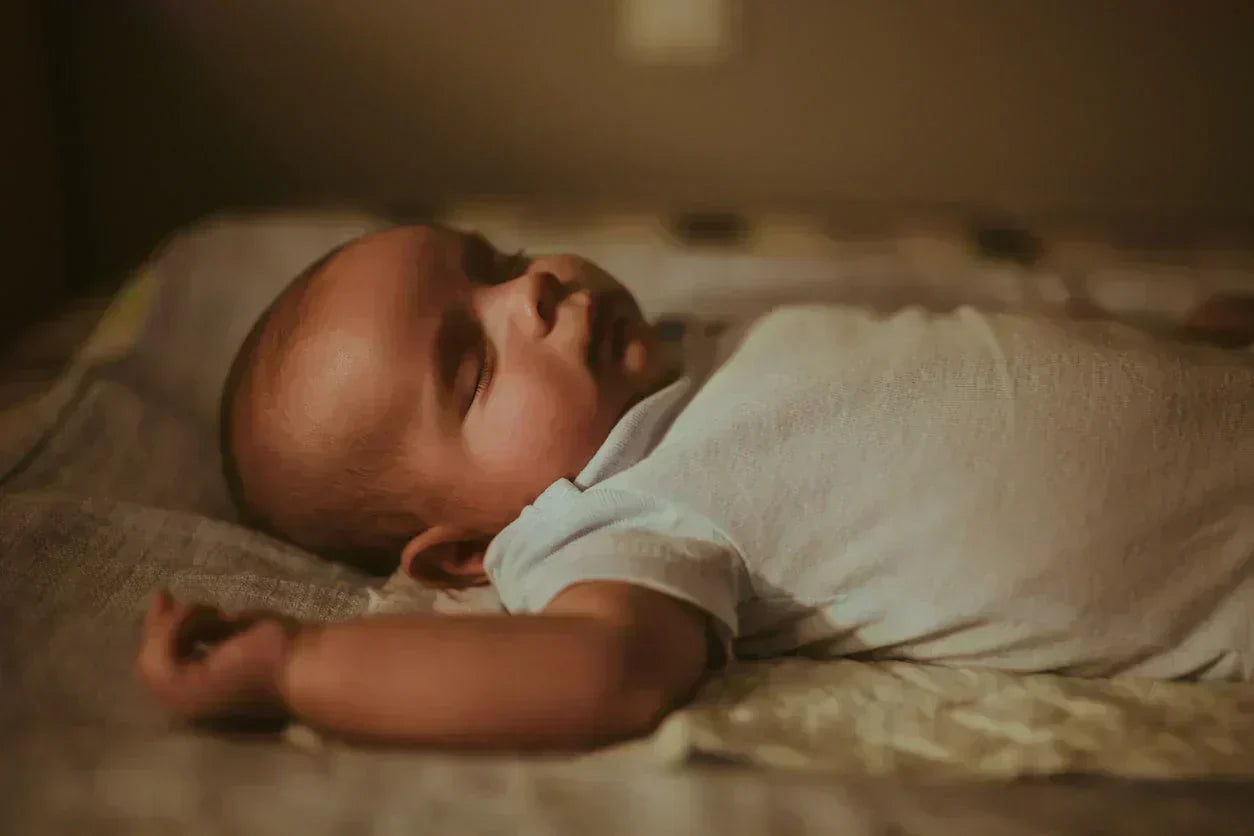 When can newborns sleep on their stomach safely?